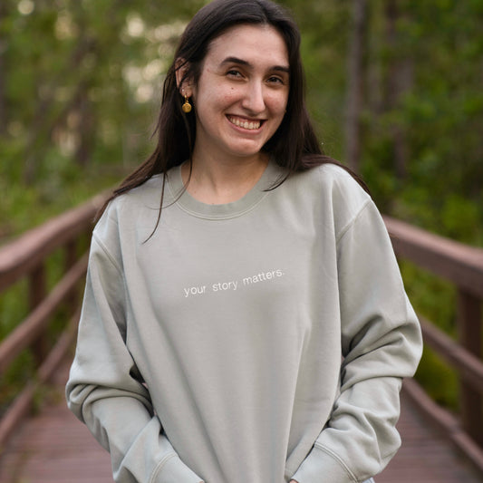 "your story matters" embroidered crewneck